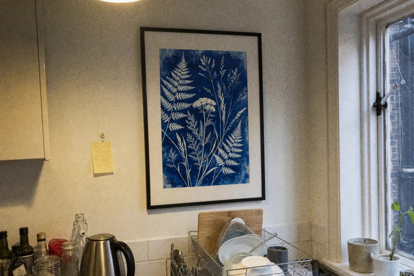 Illustrative mockup of a fern print in a kitchen